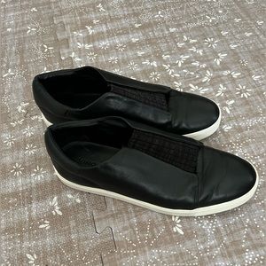 Vince black leather slip on sneakers